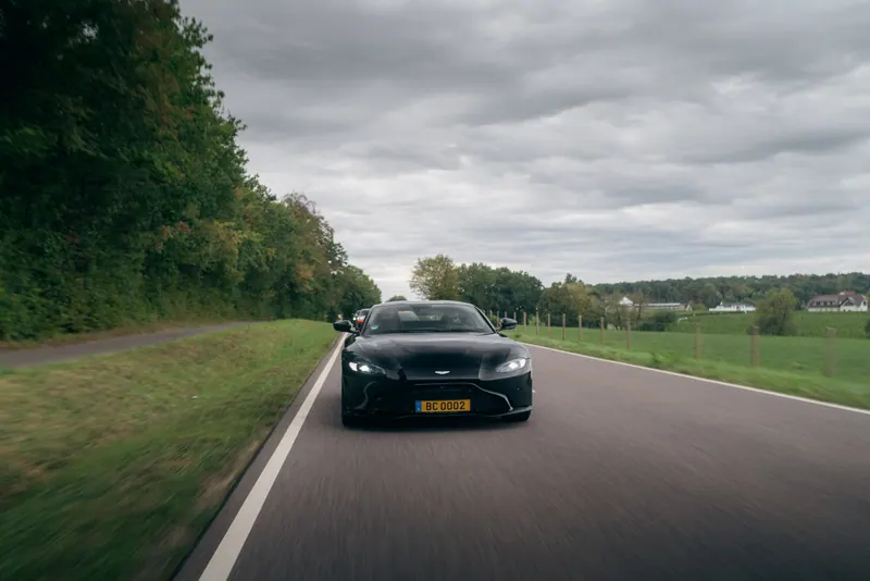 A black car on a country road