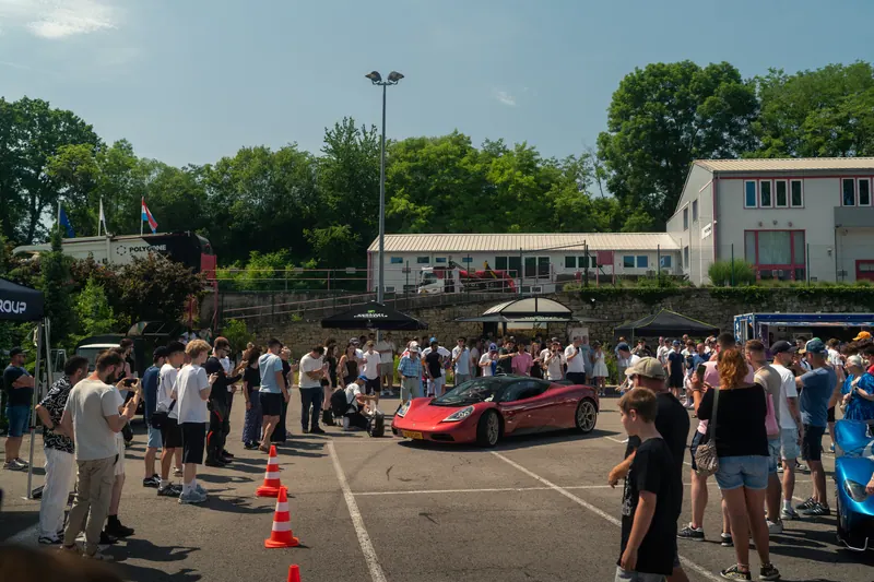 Visitors and cars filling the Supercar Sunday gathering